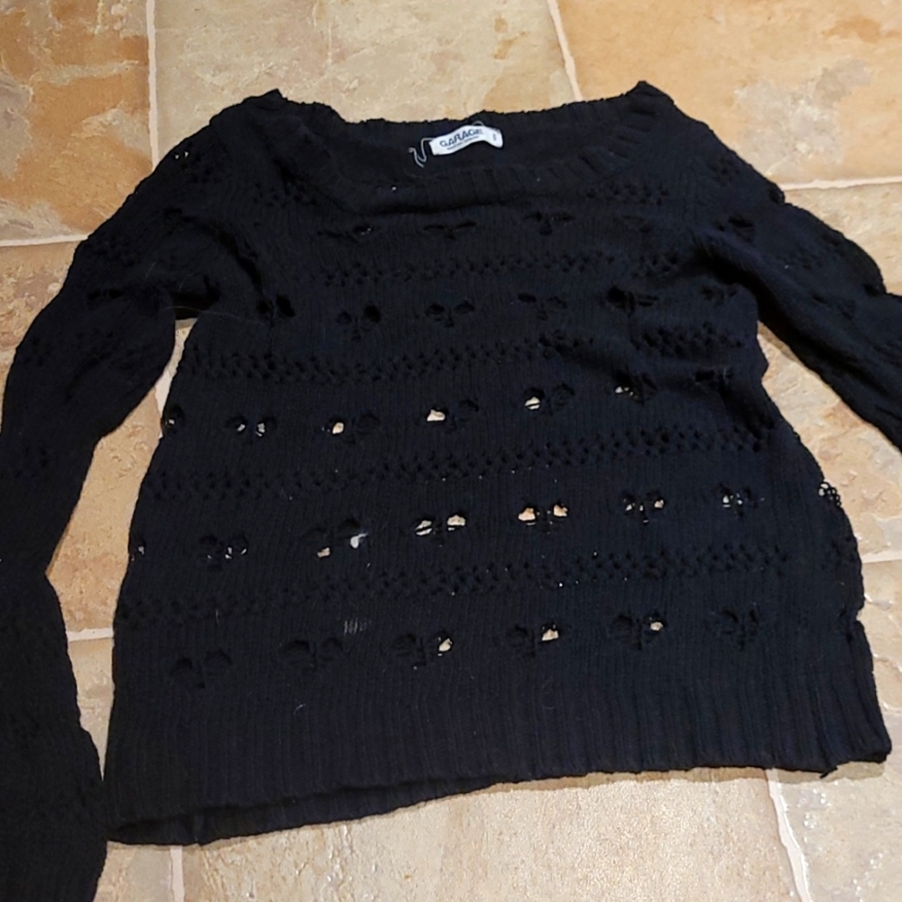 Cute y2k sweater with heart shaped holes!